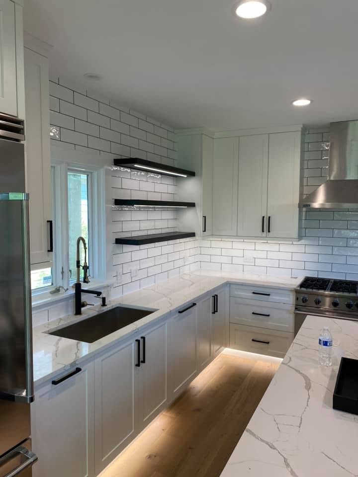 Recessed and under-cabinet lighting installed in a remodeled kitchen