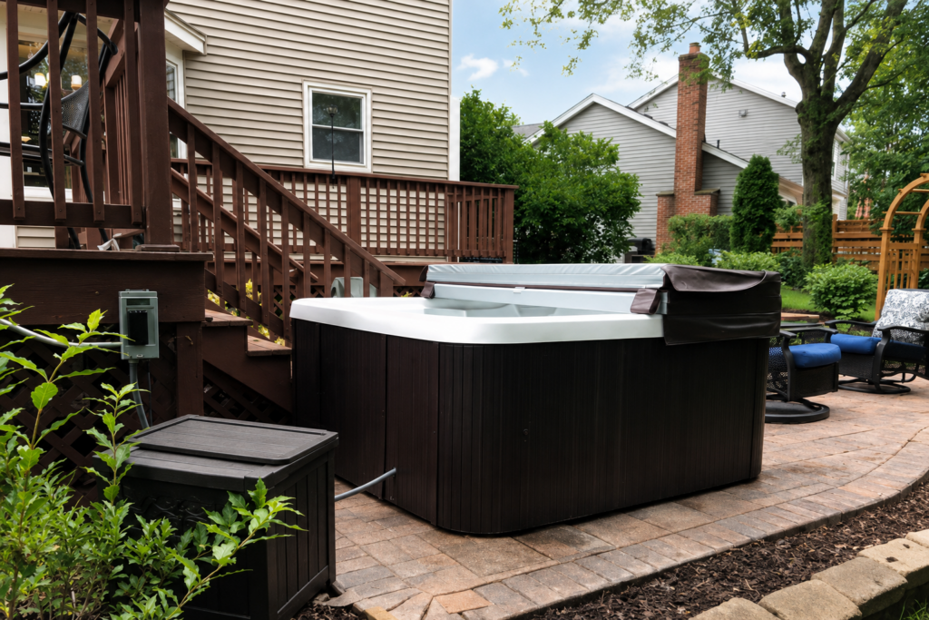 Backyard hot tub with professionally installed electrical connection